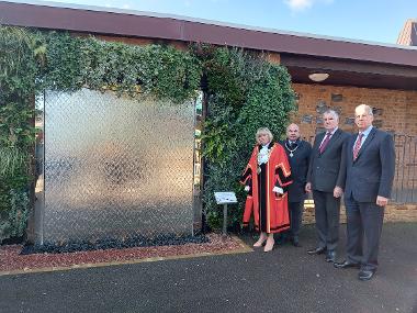 Photo of Mayor, Consort, Cllr Edwards and Cllr Lavery beside COVID memorial at Breakspear Crematorium