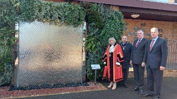 Photo of Mayor, Consort, Cllr Edwards and Cllr Lavery beside COVID memorial at Breakspear Crematorium