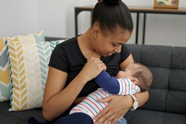 Photo of mother breastfeeding her baby