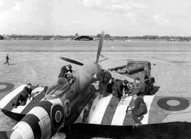 Photo of men working on a Spitfire 