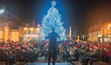 Brass band playing Christmas tunes on the civic centre forecourt