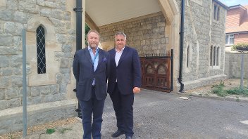 Cllr Jonathan Bianco and Cllr Steve Tuckwell outside the newly-refurbished Hillingdon and Uxbridge Cemetery Gatehouse