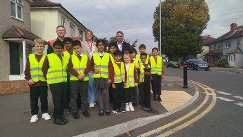 Cllr Steve Tuckwell with Rebecca Beaumont, headteacher of Hayes Park Primary and students