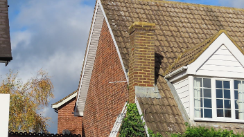 Photo of the house of Ms Naylor and her chimney which she was told could fall down