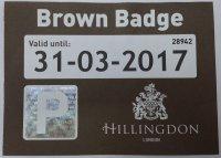 Brown badge