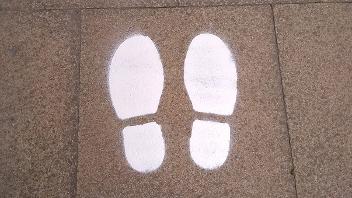 Footsteps pavement markings for social distancing 